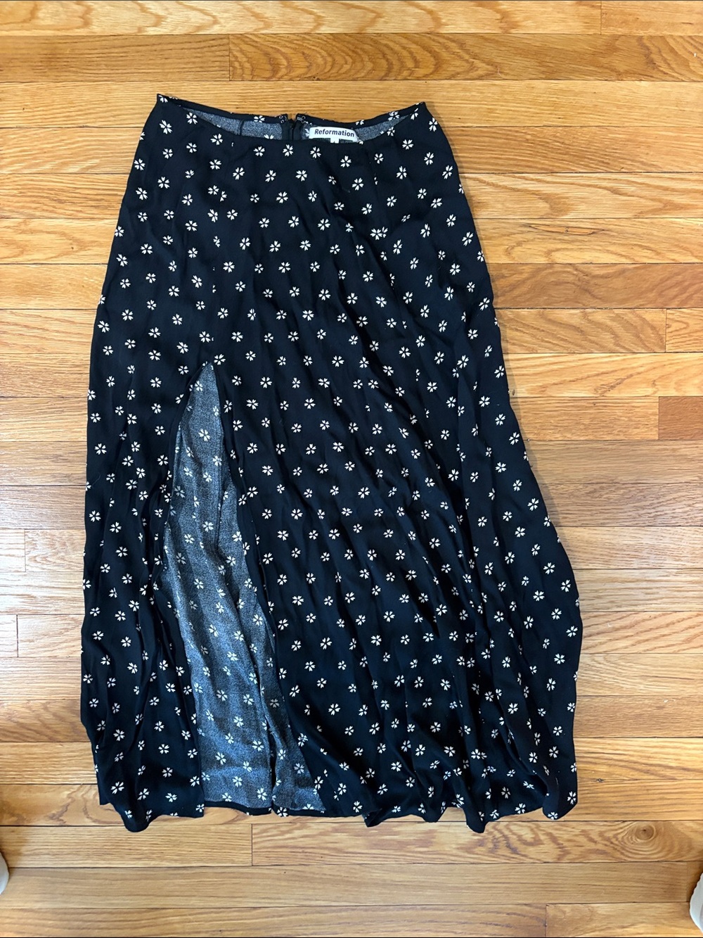 Reformation Black Maxi Skirt with White Daisy Print and Front Slit